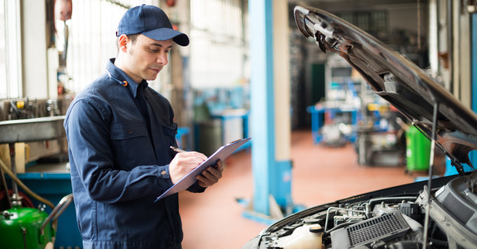 Mechanic writing an estimate